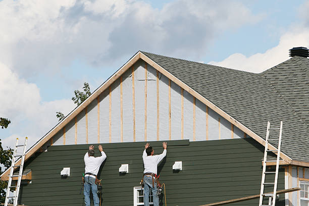 Professional Siding Contractor technician working in Eure, NC